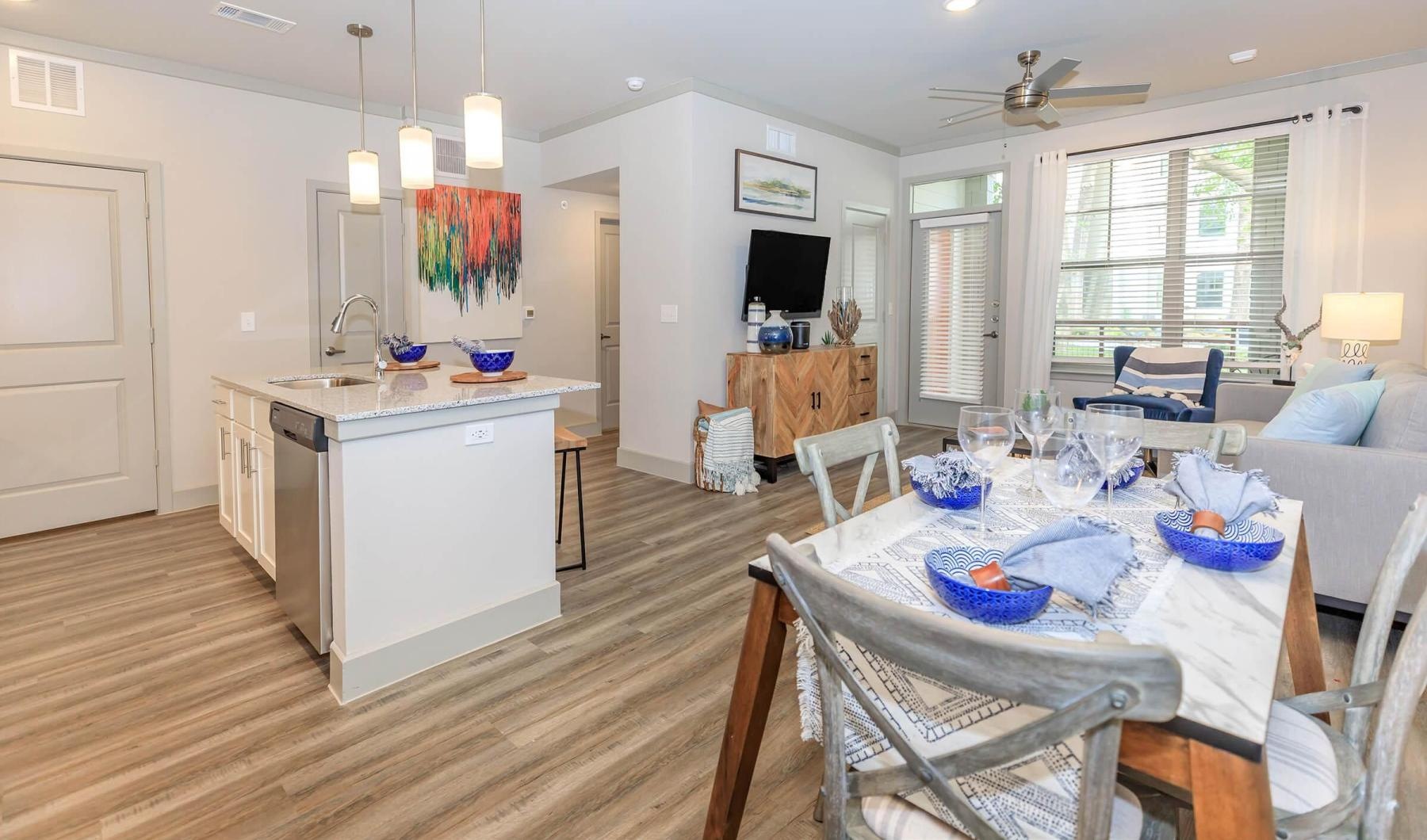 Wide open living areas perfect for entertaining a large living room with a dining table and chairs